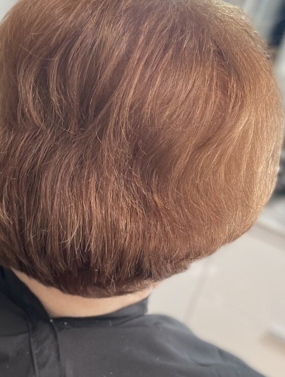 Glossy copper bob, blow-dried smooth