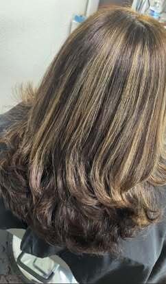 Caramel highlights through long layers