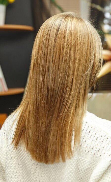 Honey blonde made glossy and sleek